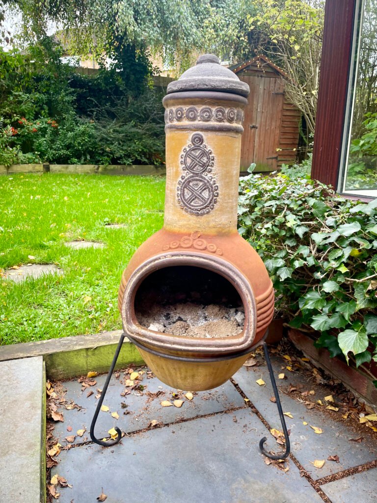 Fire pit in garden for a pirate-themed garden cinema night