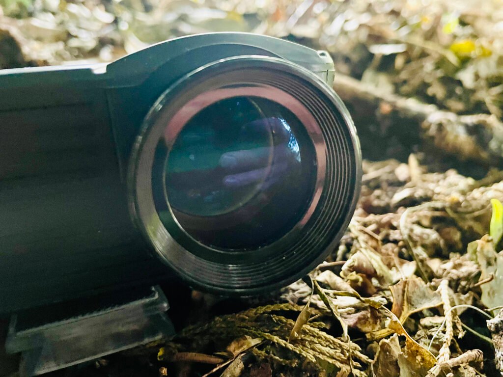 Projector sitting in woodland ready for horror-themed garden cinema night