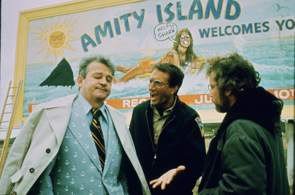 Amity Island sign from Jaws, Martin Brody next to it